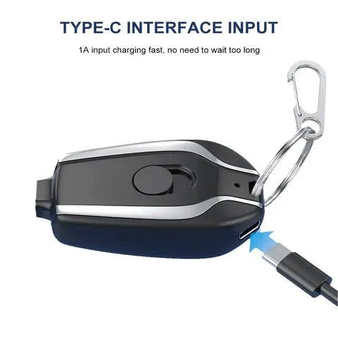 Mini rechargeable emergency phone charger keychain with Type-C charging port for portable mobile charging.