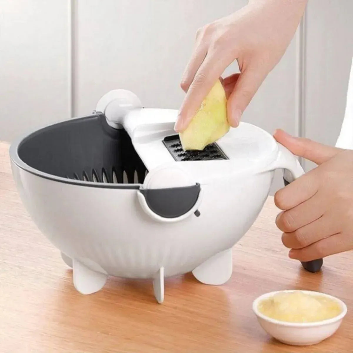 3-in-1 wet basket vegetable cutter and strainer with built-in slicer for washing, draining, and slicing vegetables.