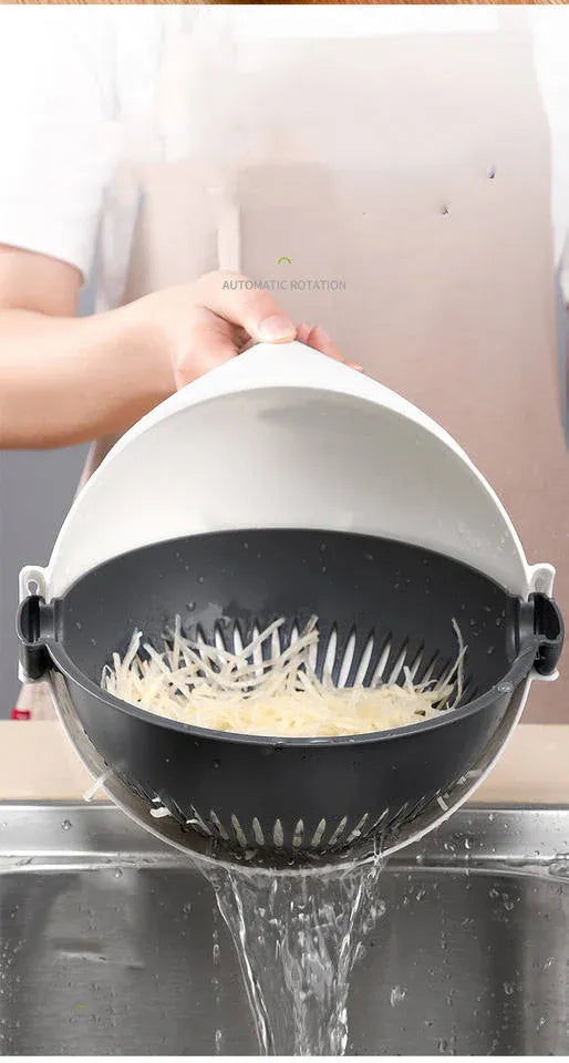 3-in-1 wet basket vegetable cutter and strainer with built-in slicer for washing, draining, and slicing vegetables.
